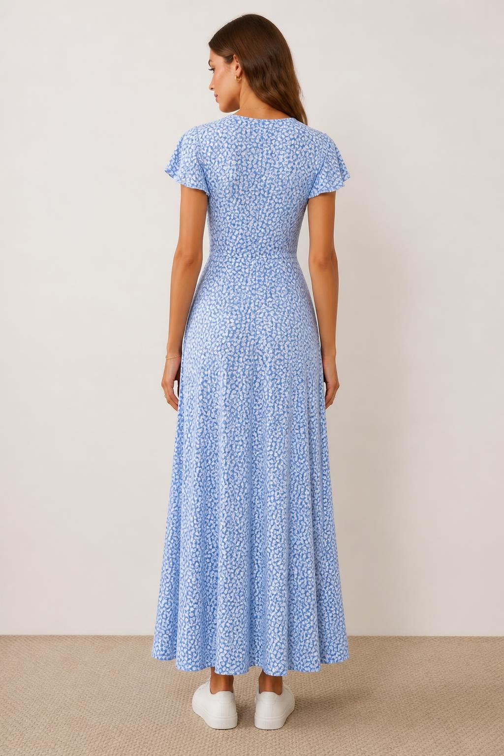 Eliana | Floral Maxi Dress, Chic Style with Tie Straps and Ruffle Details - back view