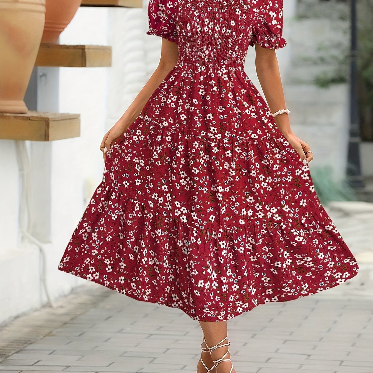 Elegant mid-length floral dress with ruffle sleeves and gathered waist