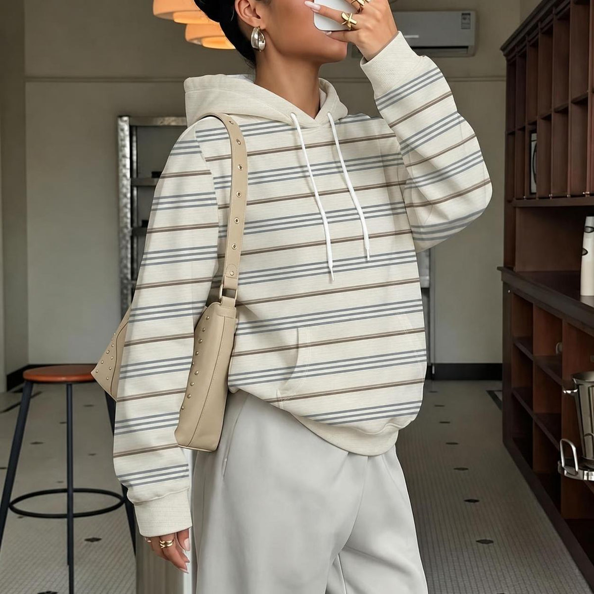 Women's striped oatmeal hoodie with kangaroo pocket
