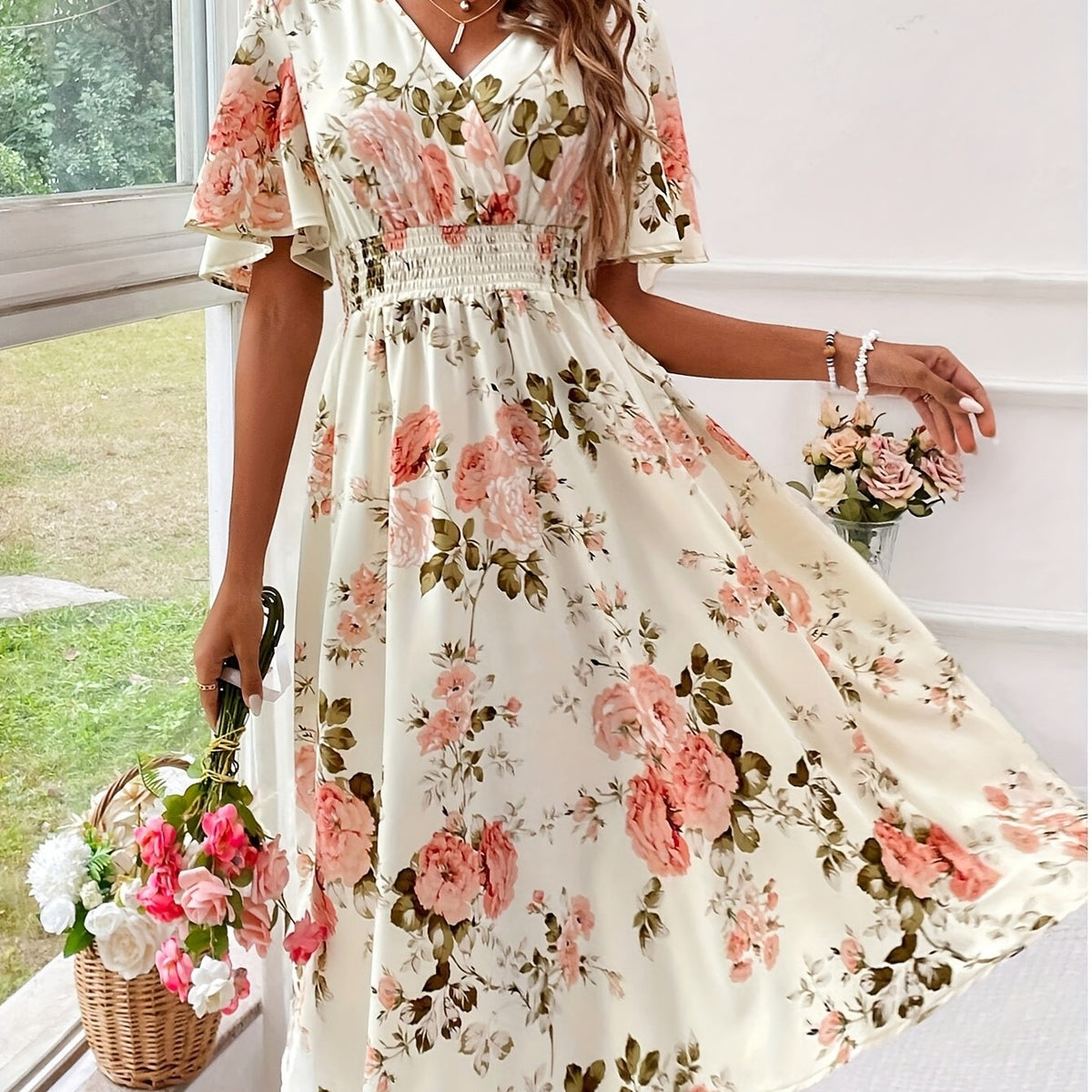 Elegant Floral Dress with Flutter Sleeves and Ruched Waist